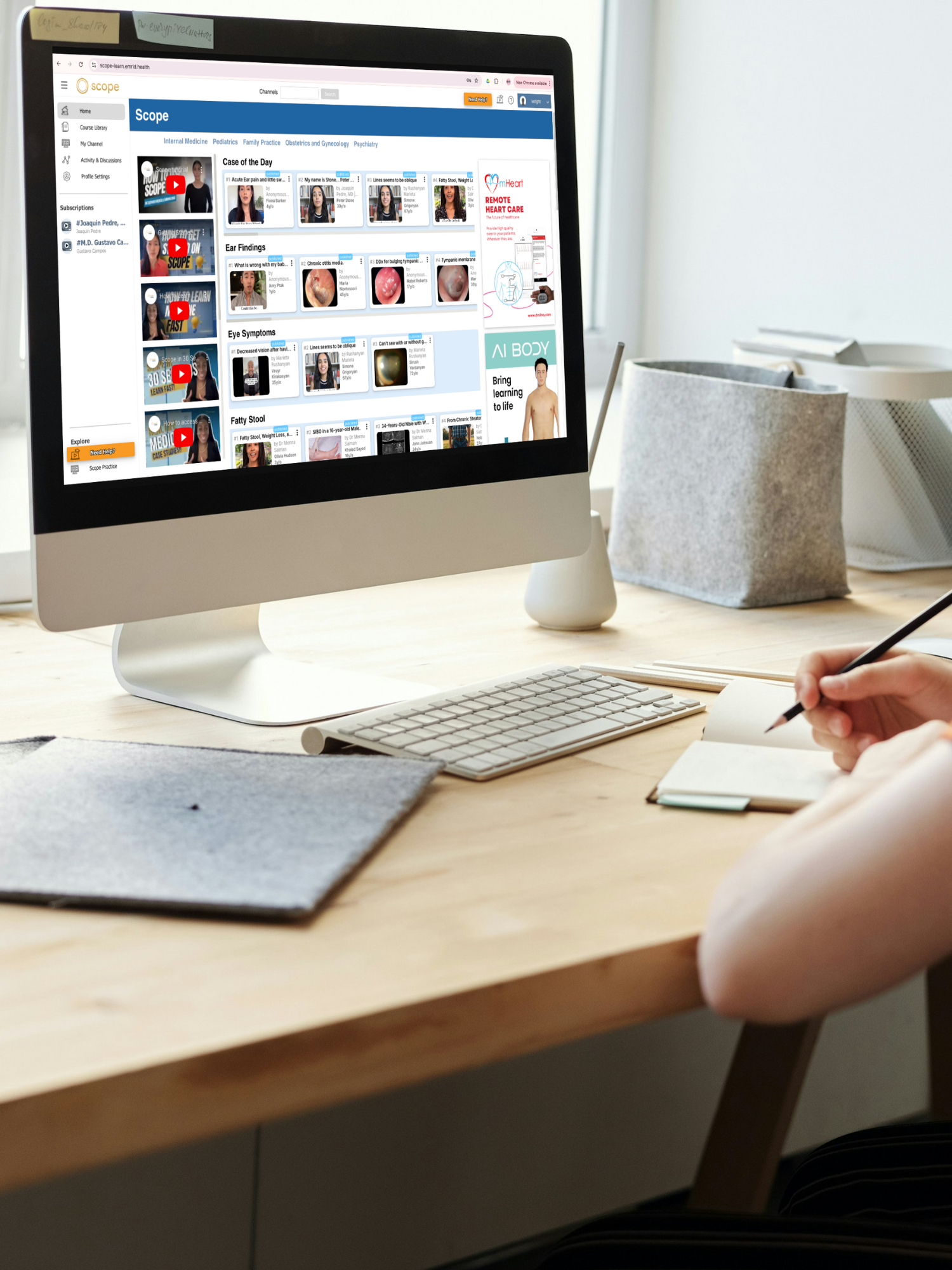 Top View Photo of Girl Watching Video Through Imac